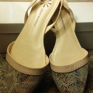 Ladies sling back flat shoes.